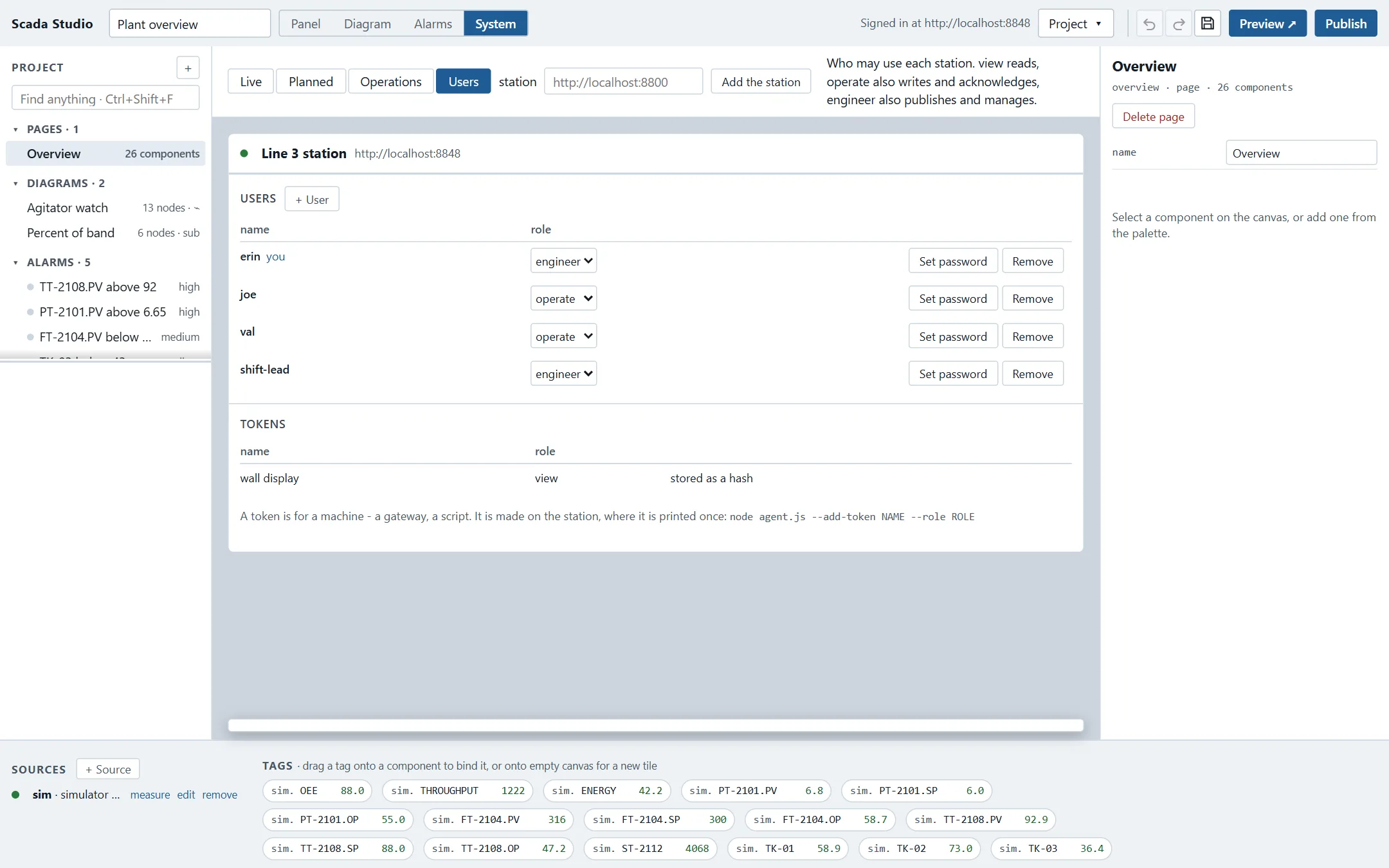 The System view's Users tab, signed in at a station as an engineer: four users with their roles, each with Set password and Remove, a + User button, and the station's token for a wall display.